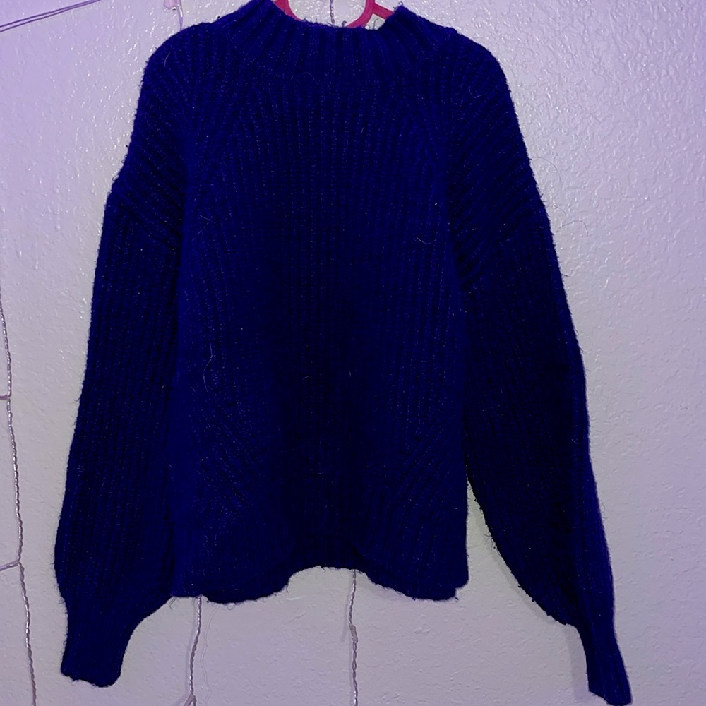 Cute sweater, perfect for fall time / colder weather. Nice deep blue & comfy!